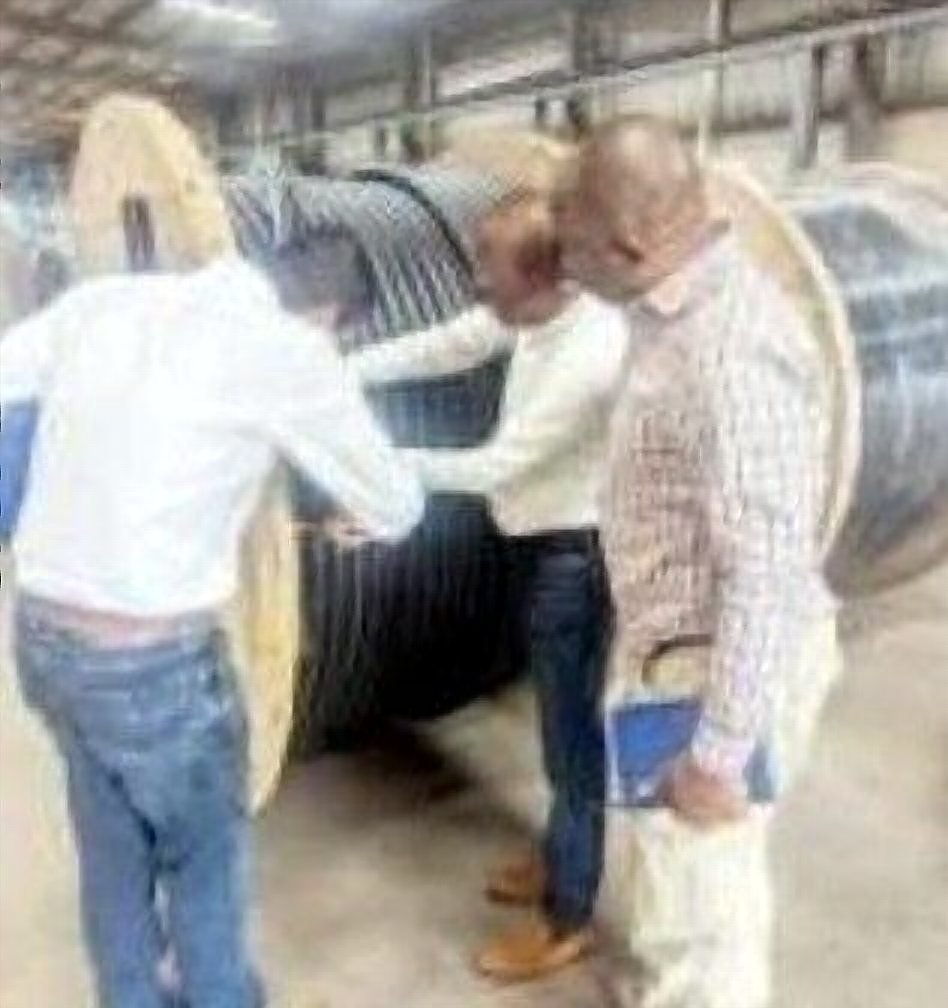 Maydok Ventures engineers inspecting cable reels at a project site