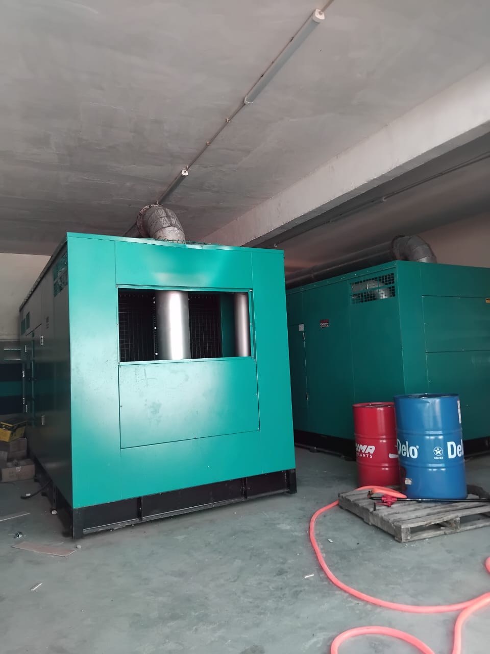 Two canopied diesel generator sets in a plant room, Beira, Mozambique